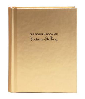A gold book titled 'The Golden Book of Fortune-Telling.'