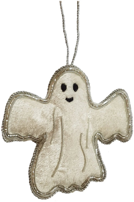 A decorative ornament of a velvet white ghost embroidered in silver with a smiling face.