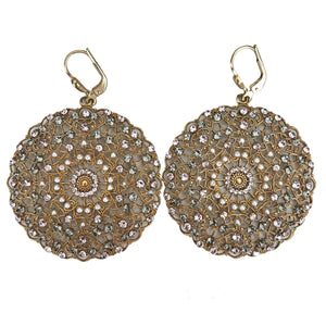 Round gold filigree earrings dotted with grey and purple crystals and white pearls